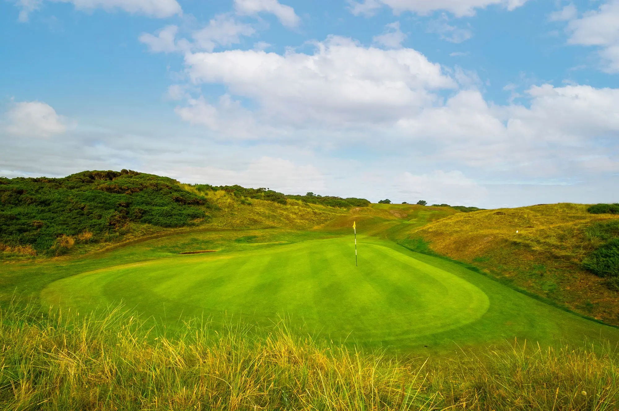 A green framed by gorse and dunes at Murcar